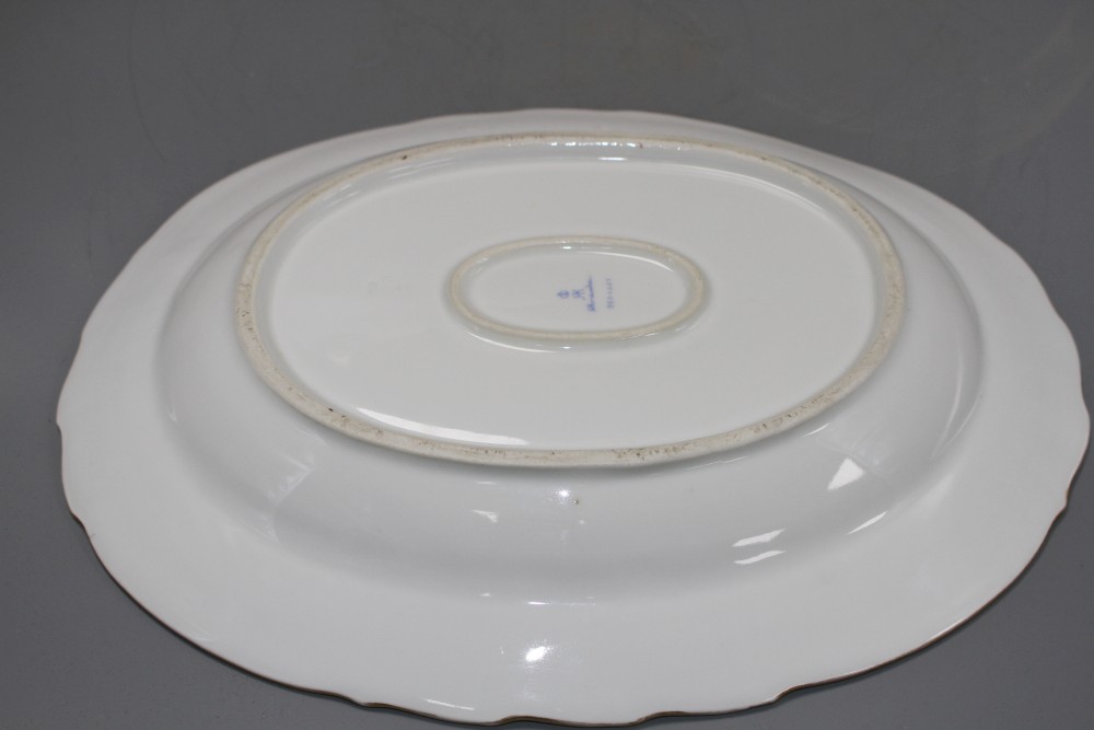 A Dresden porcelain meat plate, painted with flowers, 38.5cm